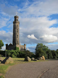 View of tower against cloudy sky