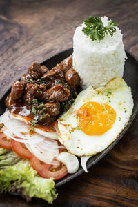 Close-up of breakfast served on table