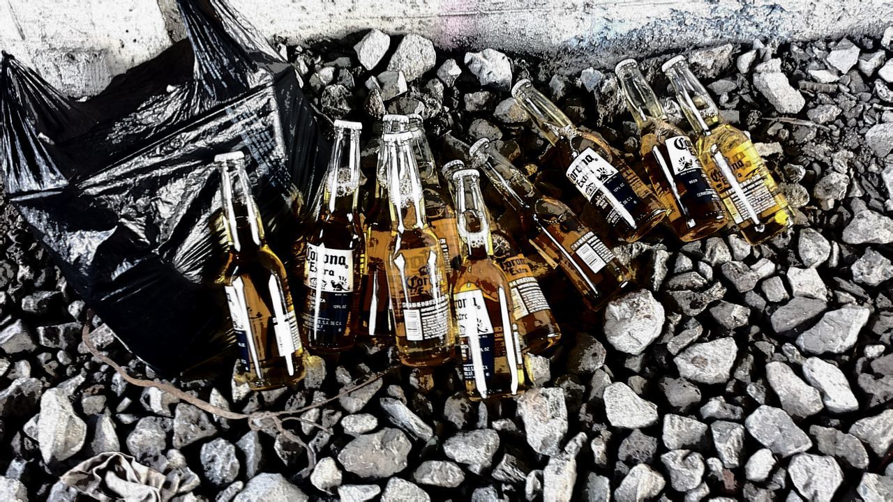 abundance, large group of objects, stack, stone - object, metal, high angle view, rusty, abandoned, outdoors, day, obsolete, no people, old, metallic, deforestation, firewood, sunlight, wood - material, rock - object, construction site