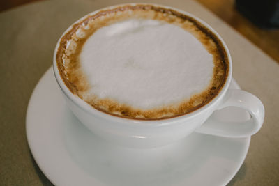 High angle view of cappuccino on table