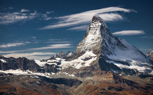 Scenic view of mountain against sky during winter