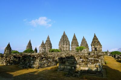 View of temple against blue sky. prambanan temple. 