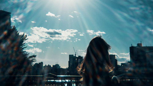 Buildings against sky on sunny day