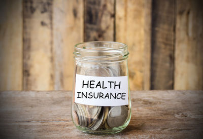 Close-up of glass jar on table