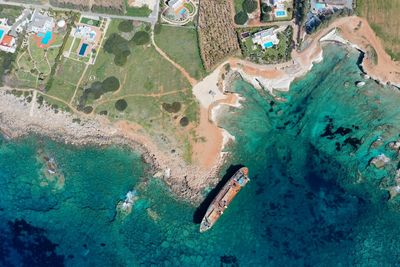 Coastal shipwreck in paphos cyprus edro 3 high view villas and rocks 