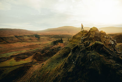 Scenic view of landscape against sky levitating 