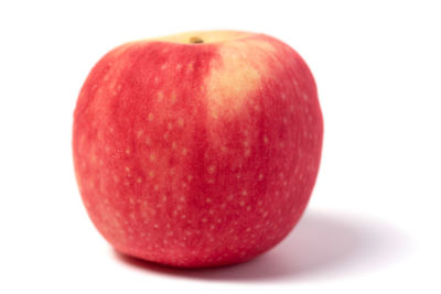 Close-up of apple against white background