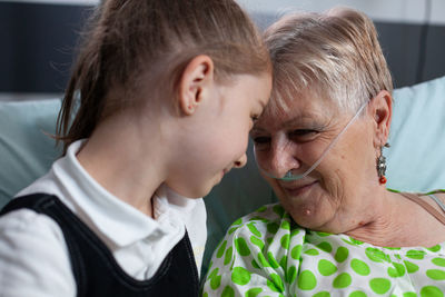 Close-up of young woman looking away