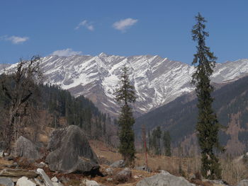 Scenic view of snow covered mountains