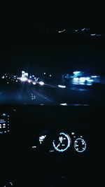 Light trails on street in city at night