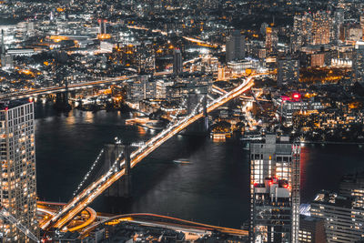 High angle view of illuminated city at night