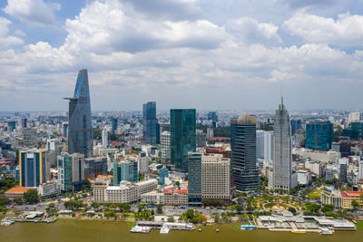 Modern buildings in city against sky