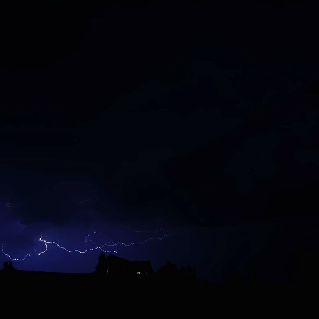 lightning, power in nature, night, thunderstorm, storm, thunder, sky, cloud, beauty in nature, darkness, warning sign, dark, forked lightning, copy space, sign, electricity, communication, silhouette, nature, no people, illuminated, environment, light - natural phenomenon, storm cloud, dramatic sky, outdoors, scenics - nature