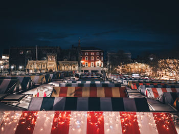 Illuminated buildings in city at night