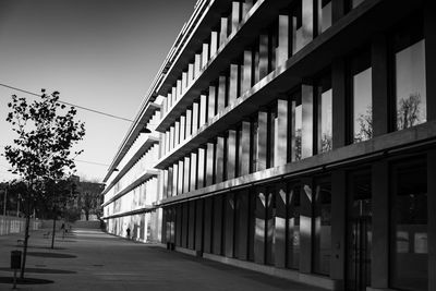 View of road along buildings