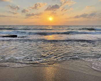 Scenic view of sea against sky during sunset