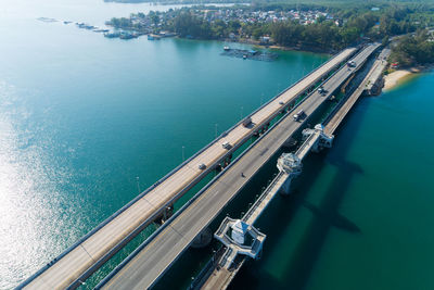 Aerial top view drone shot of bridge with cars on bridge road image transportation background