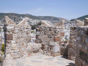 Old ruins against clear sky in city