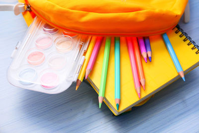 High angle view of multi colored pencils on table