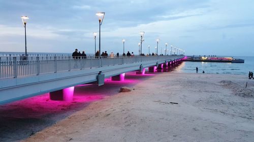 View of pier over sea against sky