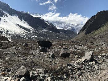 Scenic view of snowcapped mountains against sky