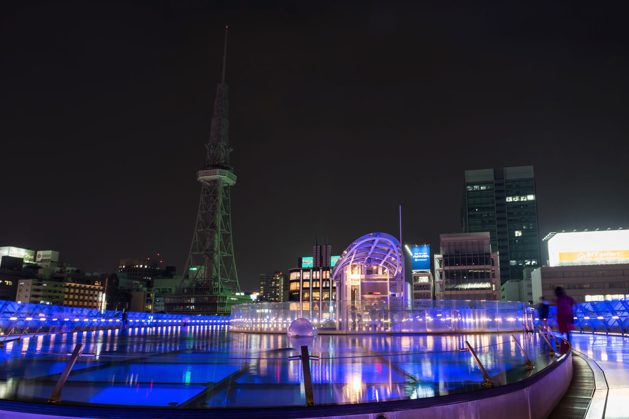 night, illuminated, architecture, built structure, building exterior, travel destinations, city, skyline, cityscape, water, amusement park, travel, landmark, arts culture and entertainment, tourism, nature, amusement park ride, reflection, building, no people, light, ferris wheel, outdoors, sky