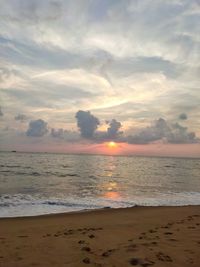 Scenic view of sea against sky during sunset