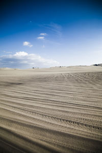 Scenic view of desert against sky
