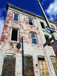 Low angle view of old building against sky