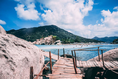 Pier over lake against sky