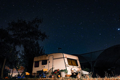 Built structure against clear sky at night