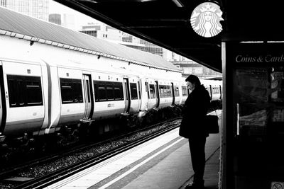 Man walking on railroad station platform