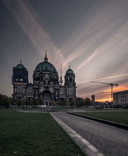 View of historic building against sky during sunset