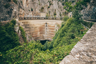 High angle view of dam against trees