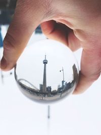 Close-up of person holding glass