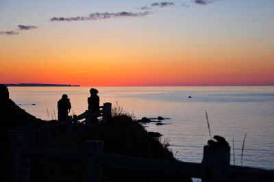 Scenic view of sea at sunset