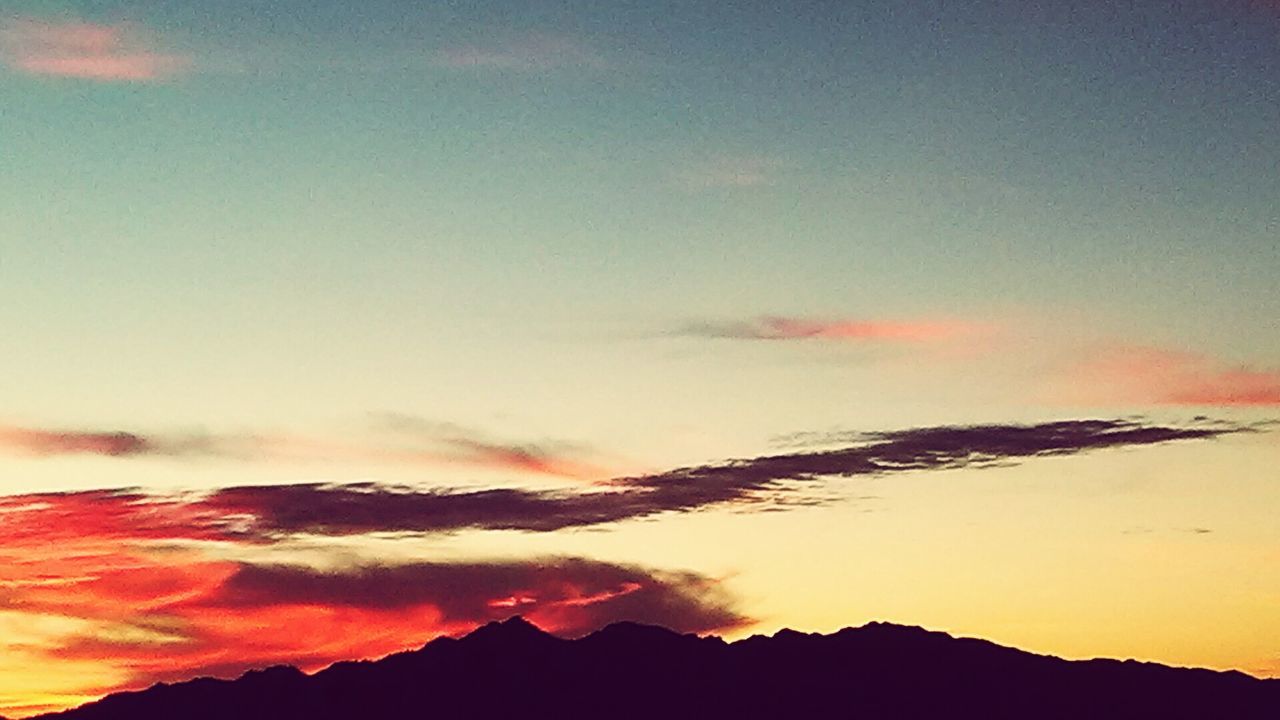 SCENIC VIEW OF DRAMATIC SKY OVER MOUNTAIN