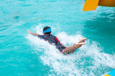 High angle view of man in swimming pool