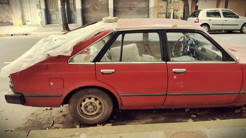 Vintage car parked on road