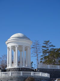 Low angle view of historical building against blue sky