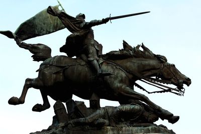 Low angle view of statue against clear sky