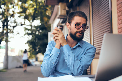 Young man using mobile phone