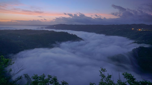 Scenic view of dramatic sky during sunset