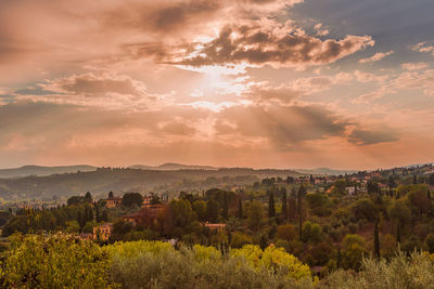 Scenic view of landscape against sky during sunset