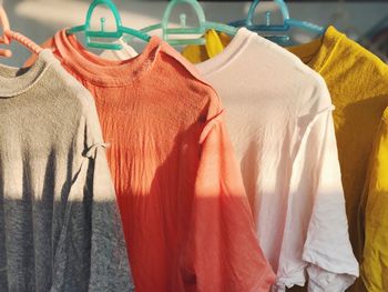 Clothes hanging on rack at store