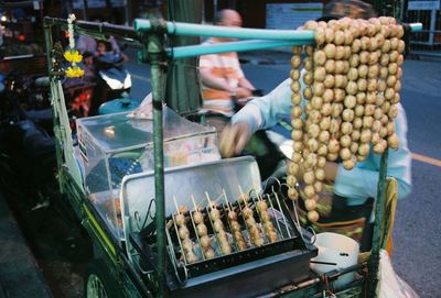 High angle view of man working at market stall