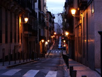 Illuminated street at night