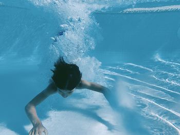 Man swimming in sea