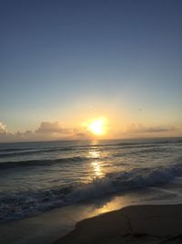 View of beach at sunset