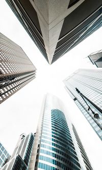 Low angle view of skyscrapers against sky